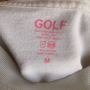 2018 Golfwang cream colored cat logo tee